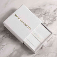 Thumbnail for Infinite Photo Necklace gift box by Brother & Sisters, elegant white packaging for a personalized keepsake.