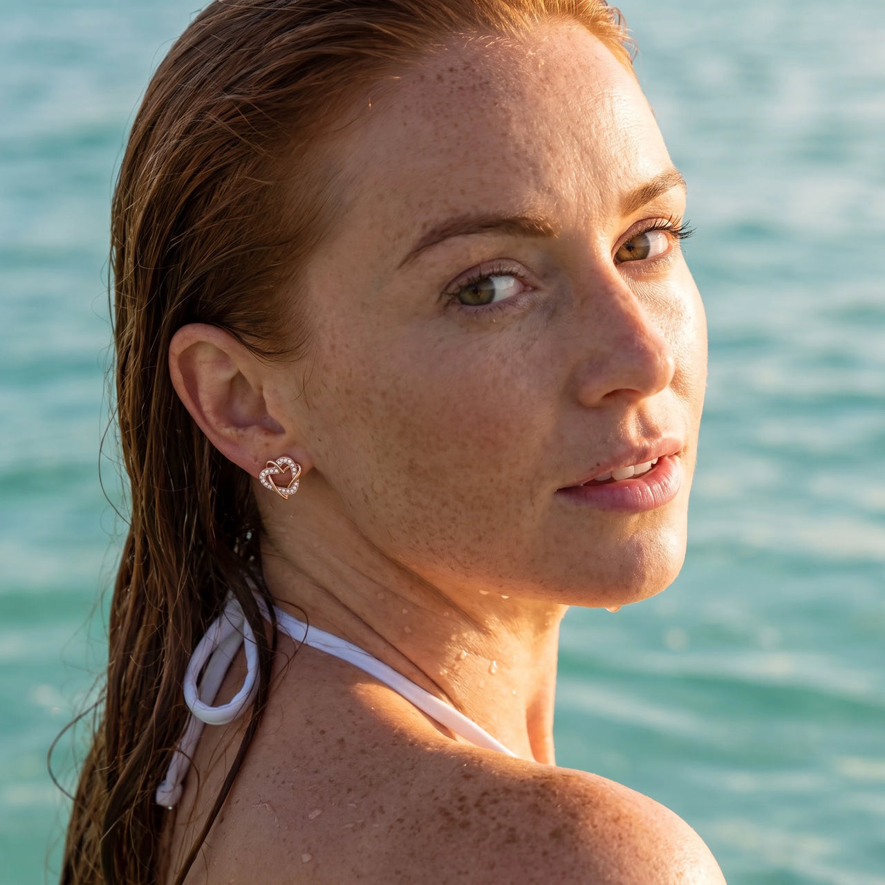 Rose gold stud earrings — worn in the water, waterproof, rose gold | SKU: 419593-rose-gold