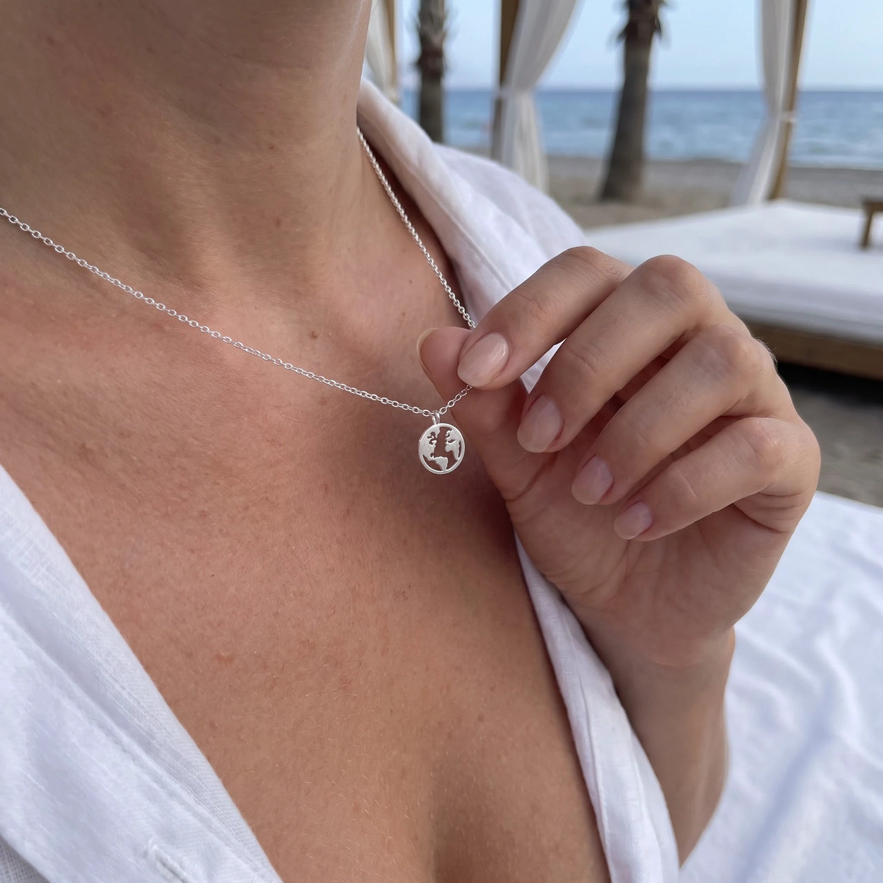 Globe pendant — worn, real size, silver | SKU: 22173453-white-gold