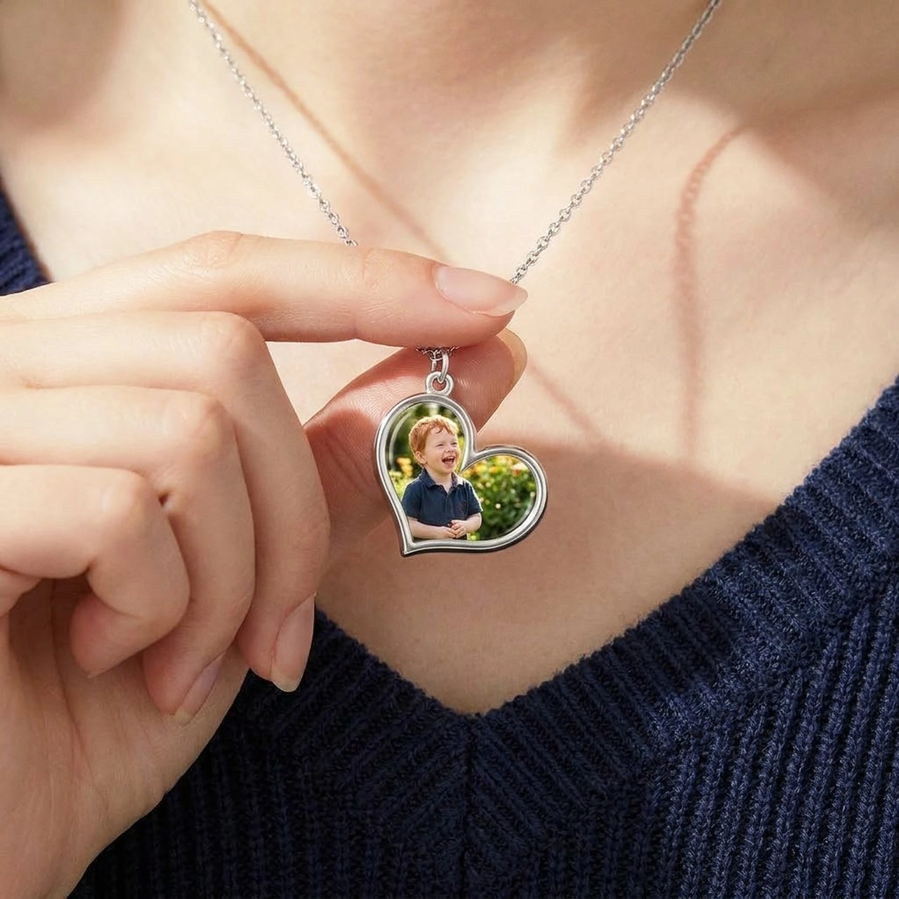 Looking down at the silver heart pendant held in her fingers, her son's photo revealed | SKU: TPH-HRTN-SILVER