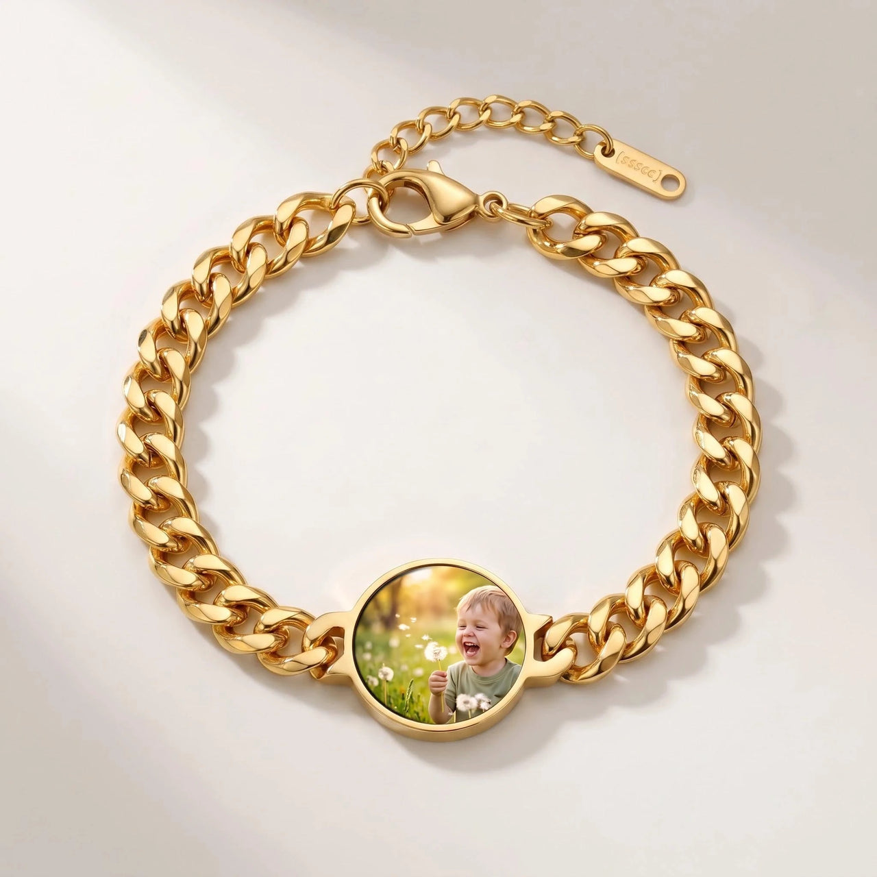 Secret Round Photo Bracelet in gold, round charm on a curb chain with the hidden photo revealed by warmth | SKU: TPH-RNDB-GOLD