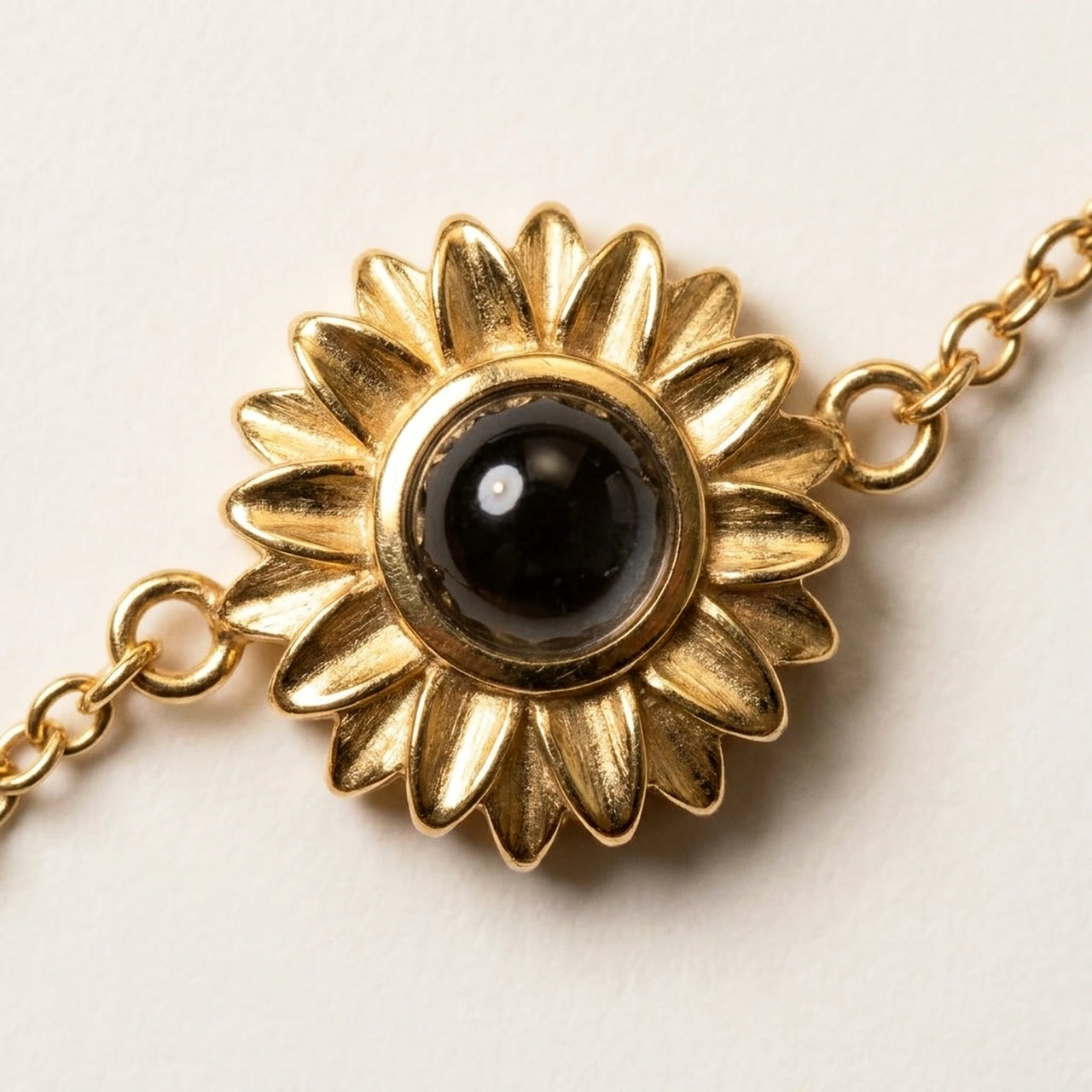Sunflower Personalized Photo Bracelet Gold - macro of the sunflower charm and its photo projection lens - Brother & Sisters
