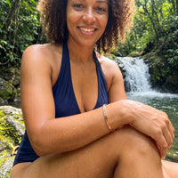 Thumbnail for Travel To Feel Alive bracelet in rose gold worn by the water | SKU: ttfa-rg